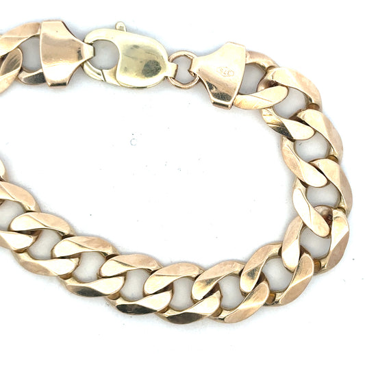 9ct yellow gold curb bracelet with a 52.6g weight, featuring classic linked design, unbranded jewelry accessory.