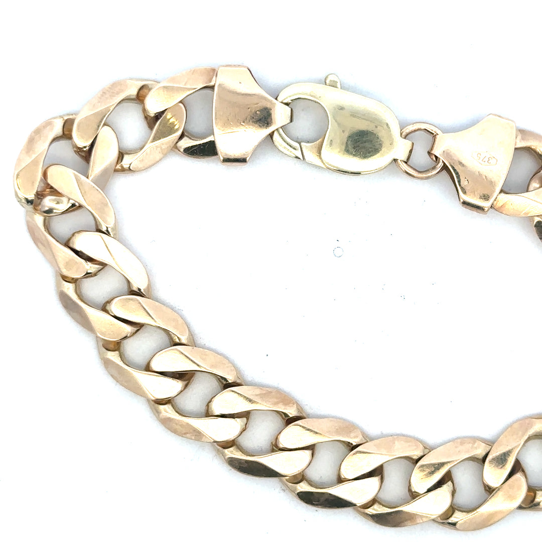 9ct yellow gold curb bracelet with a 52.6g weight, featuring classic linked design, unbranded jewelry accessory.
