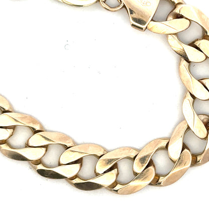 9ct yellow gold curb bracelet, unbranded, 52.6g, featuring classic linked design, shown in a close-up image.