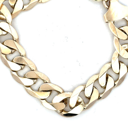 9ct yellow gold curb bracelet weighing 55g, featuring a classic chain design, shown in a detailed close-up image.