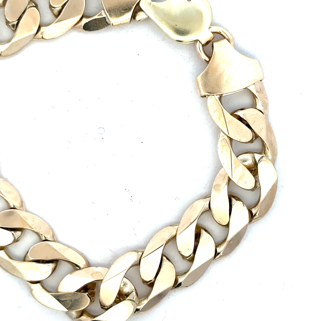 9ct yellow gold curb bracelet weighing 55g, showcasing a classic gold chain design with a secure clasp.