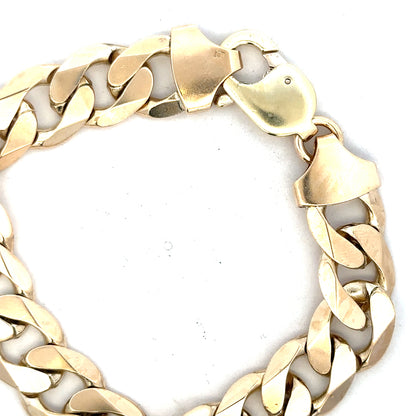 9ct yellow gold curb bracelet weighing 55g, unbranded, with a classic chain link design and polished finish.