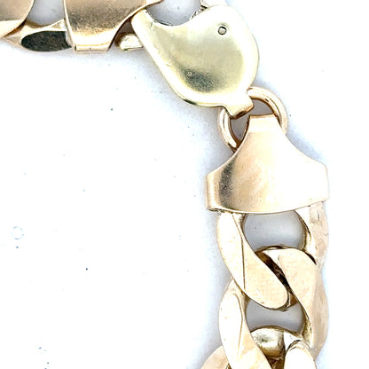 9ct yellow gold curb bracelet weighing 55g, featuring a classic chain design, jewelry image showcasing the unbranded gold bracelet.