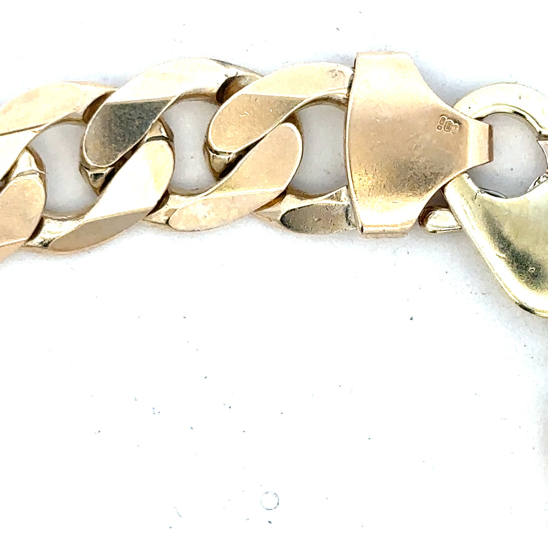 9ct yellow gold curb bracelet weighing 55g, featuring a classic linked chain design, unbranded jewelry accessory.
