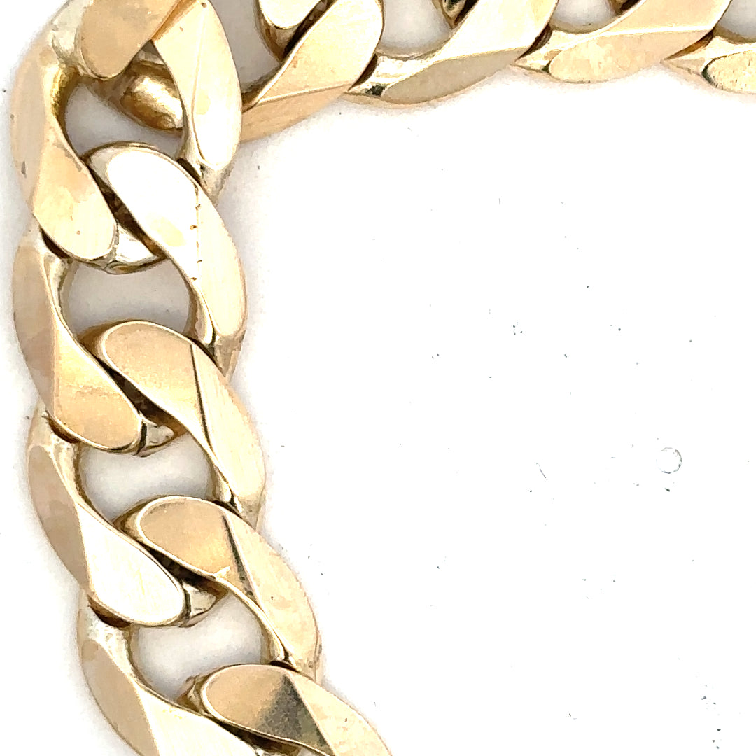 9ct yellow gold curb bracelet weighing 55g, unbranded, showcasing its polished links and classic jewelry design.