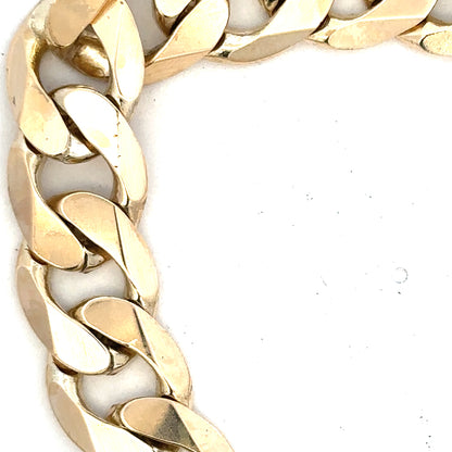 9ct yellow gold curb bracelet weighing 55g, unbranded, showcasing its polished links and classic jewelry design.