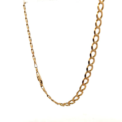 9ct yellow gold curb bracelet weighing 7.6g, stylish jewelry accessory with a classic chain design.
