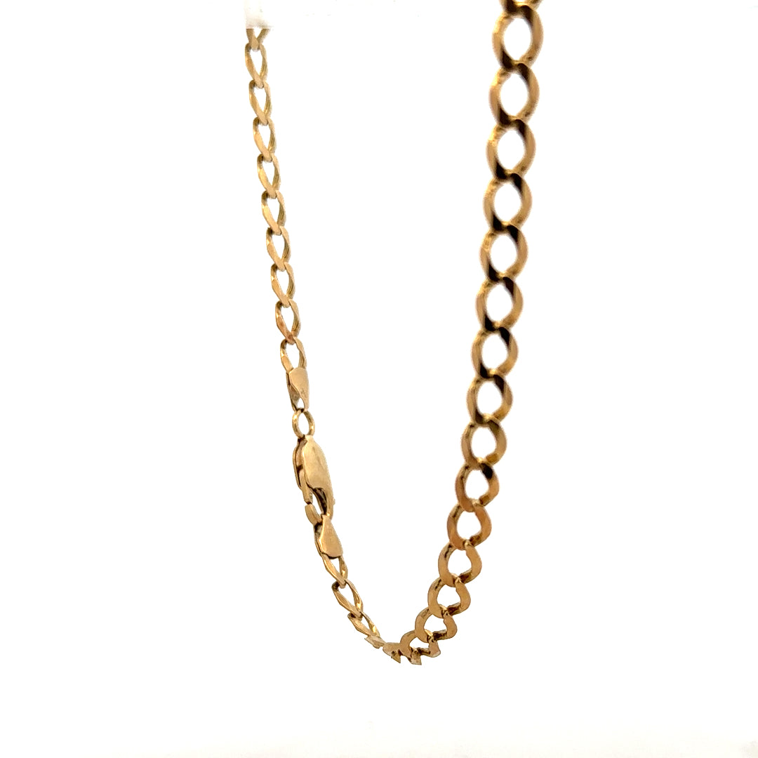9ct yellow gold curb bracelet weighing 7.6g, featuring classic linked chain design, unbranded jewelry accessory.