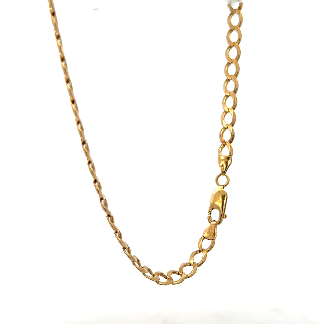 9ct yellow gold curb bracelet weighing 7.6g, featuring classic interlinked chain design on a plain background.