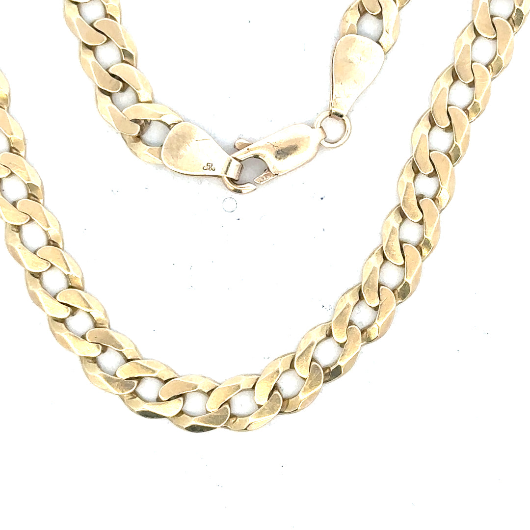 9ct yellow gold curb bracelet weighing 8.3g, featuring classic linked chain design, unbranded jewelry accessory.