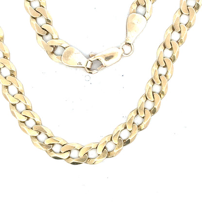 9ct yellow gold curb bracelet weighing 8.3g, featuring classic linked chain design, unbranded jewelry accessory.