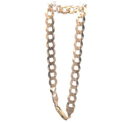9ct yellow gold curb bracelet with 8.5g weight, featuring linked chain design, unbranded jewelry accessory.