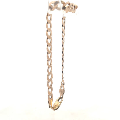 9ct yellow gold curb bracelet with a secure clasp, weighing 8.5g, showcasing polished gold links for a classic jewelry look.