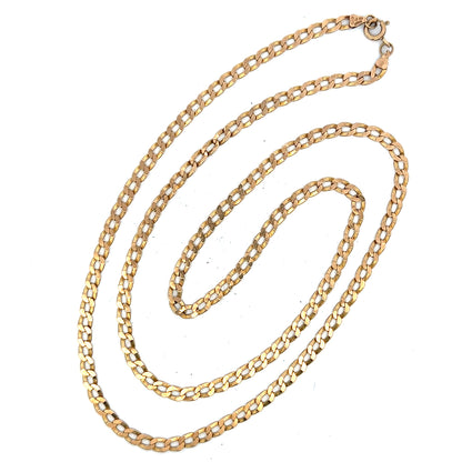 9ct yellow gold curb chain weighing 11.5g, featuring a classic linked design, suitable for everyday wear.
