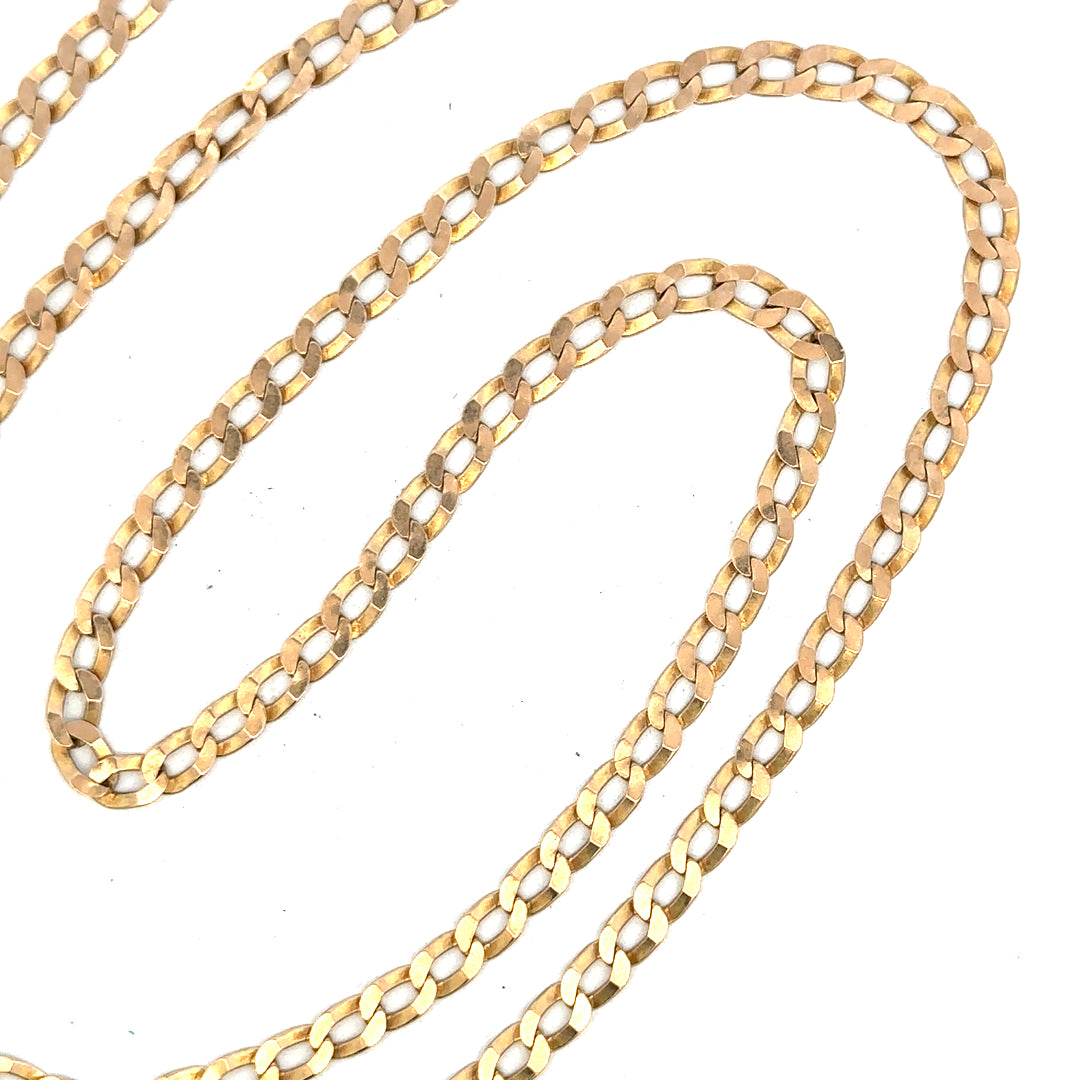9ct yellow gold curb chain weighing 11.5g, featuring classic interlinked design, crafted in gold with a polished finish.
