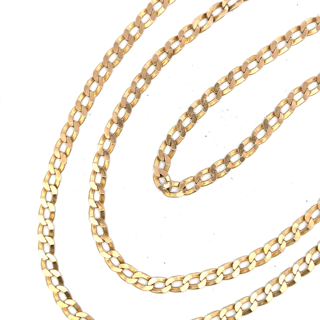 9ct yellow gold curb chain weighing 11.5g, showcasing its sturdy links and polished finish.