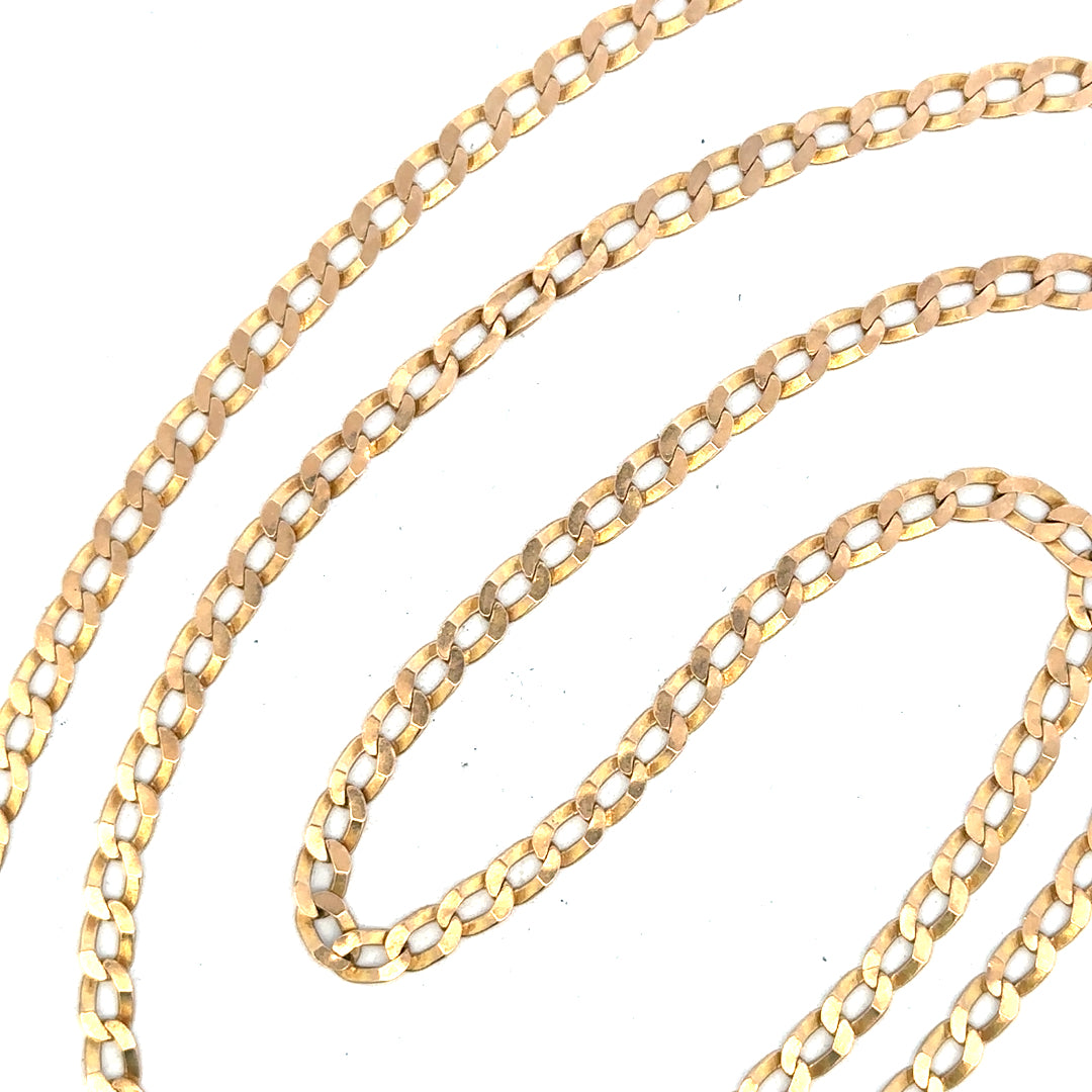 9ct yellow gold curb chain weighing 11.5g, showcasing its polished links and classic design for stylish jewelry.