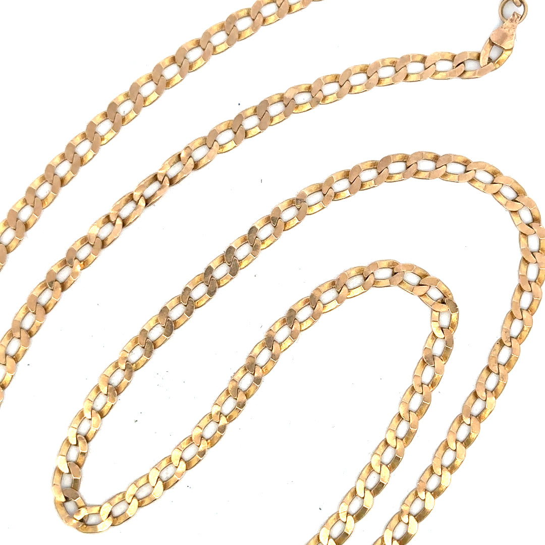 9ct yellow gold curb chain weighing 11.5g, with a classic linked design, unbranded jewelry accessory.
