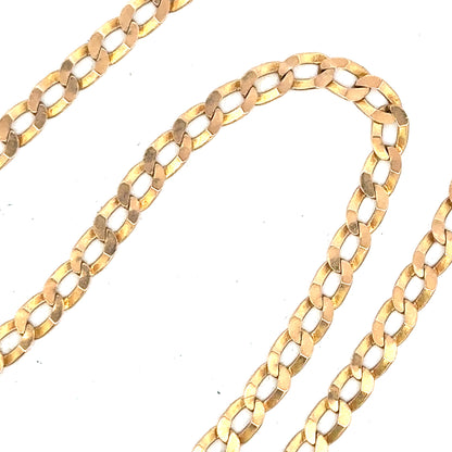 9ct yellow gold curb chain weighing 11.5g, showcasing a polished gold link design, unbranded jewelry accessory.