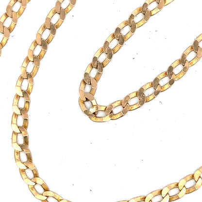 9ct yellow gold curb chain weighing 11.5g, showcasing a shiny, linked jewelry chain with a secure clasp.