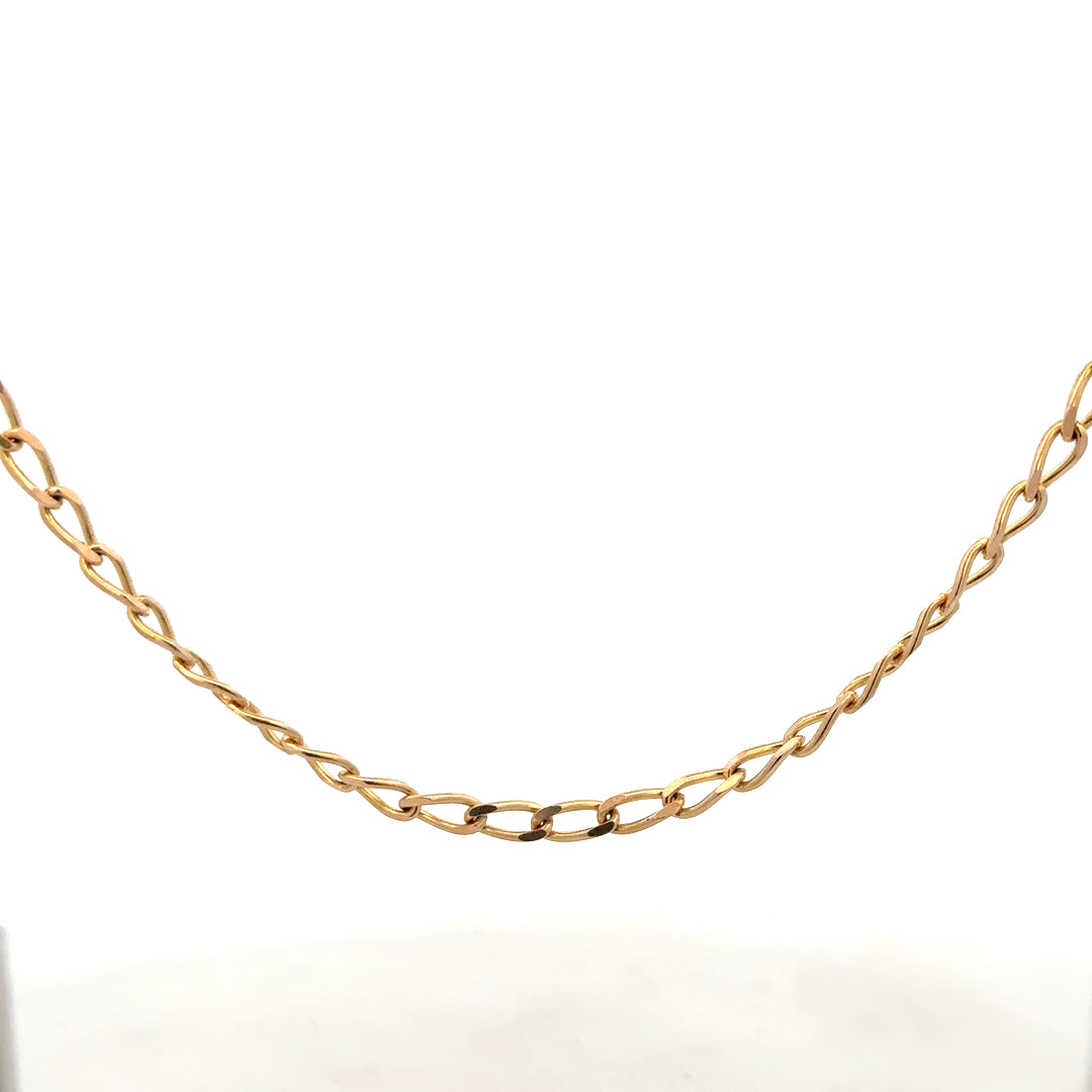 9ct yellow gold curb chain weighing 13.2g, displaying a classic linked jewelry design on a plain background.