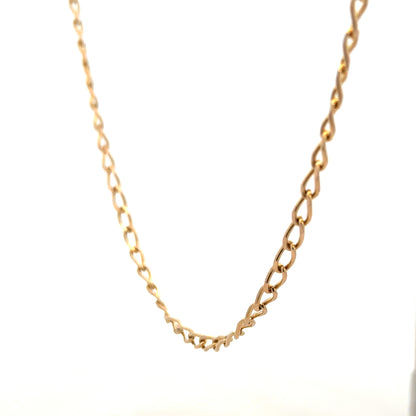 9ct yellow gold curb chain weighing 13.2g, unbranded jewelry with a classic link design, displayed on a plain background.