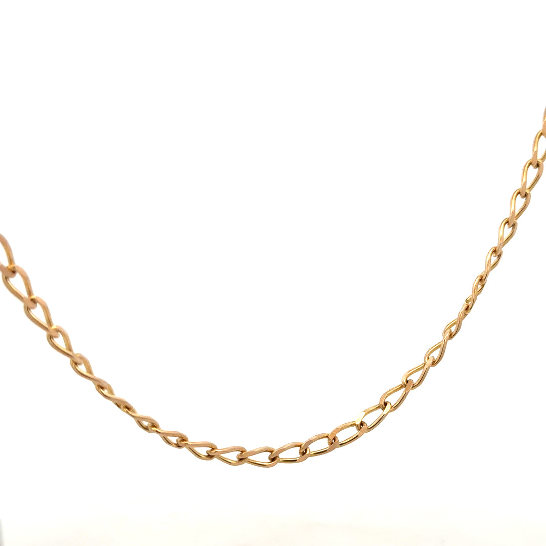 9ct yellow gold curb chain weighing 13.2g, close-up of the unbranded jewelry showing its classic link design.