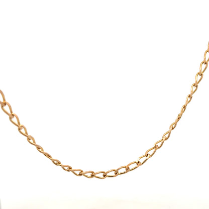 9ct yellow gold curb chain weighing 13.2g, close-up of the unbranded jewelry showing its classic link design.