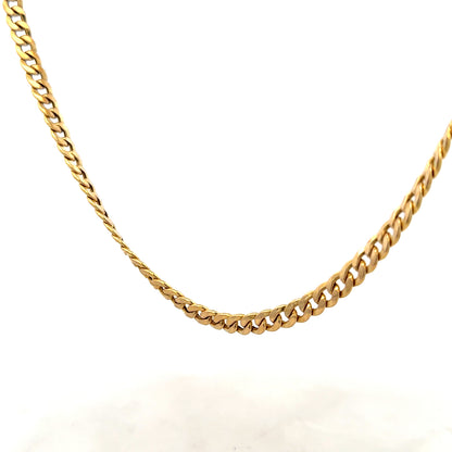 9ct yellow gold curb chain weighing 14.6g, featuring a classic linked design, unbranded jewelry accessory.