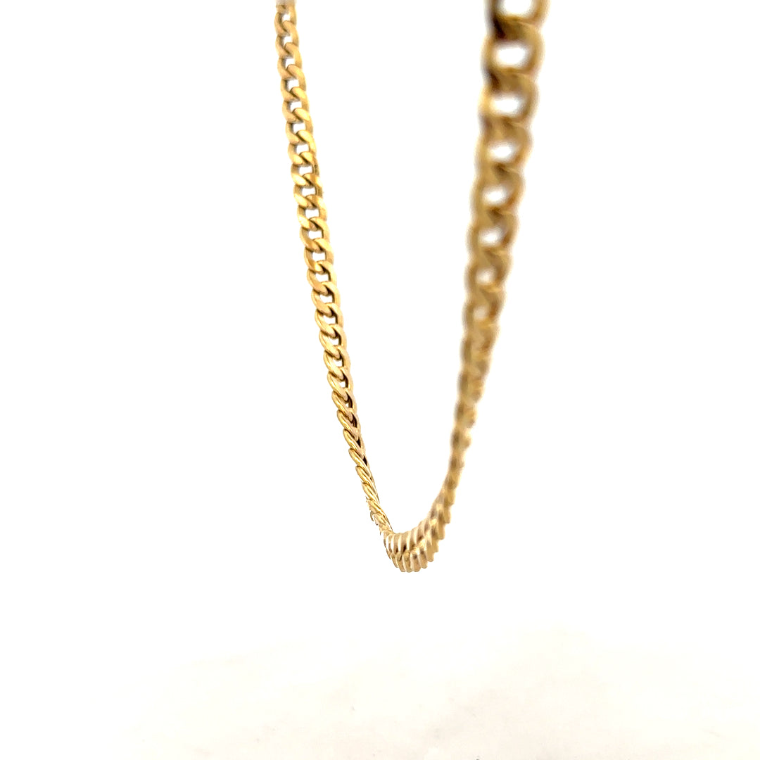 9ct yellow gold curb chain weighing 14.6g, displayed on a white background, showcasing its classic design and polished finish.
