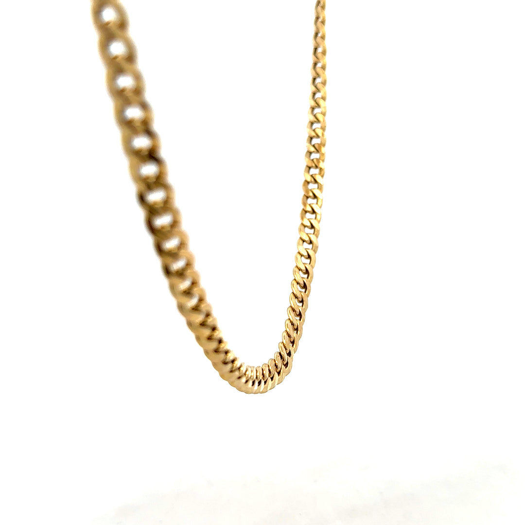 9ct yellow gold curb chain weighing 14.6g with a classic design, shown on a plain background.