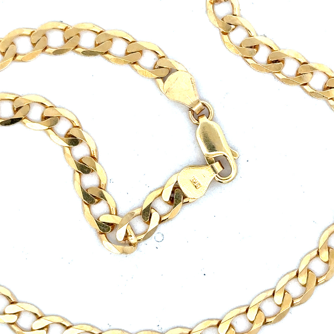 9ct yellow gold curb chain weighing 14.7g, showcasing a classic jewelry design with polished links.