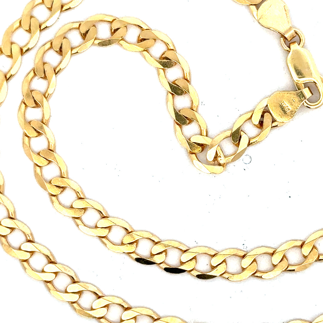 9ct yellow gold curb chain with a polished finish, weighing 14.7g, showcasing its sturdy links and elegant design.