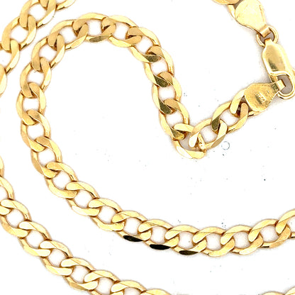9ct yellow gold curb chain with a polished finish, weighing 14.7g, showcasing its sturdy links and elegant design.
