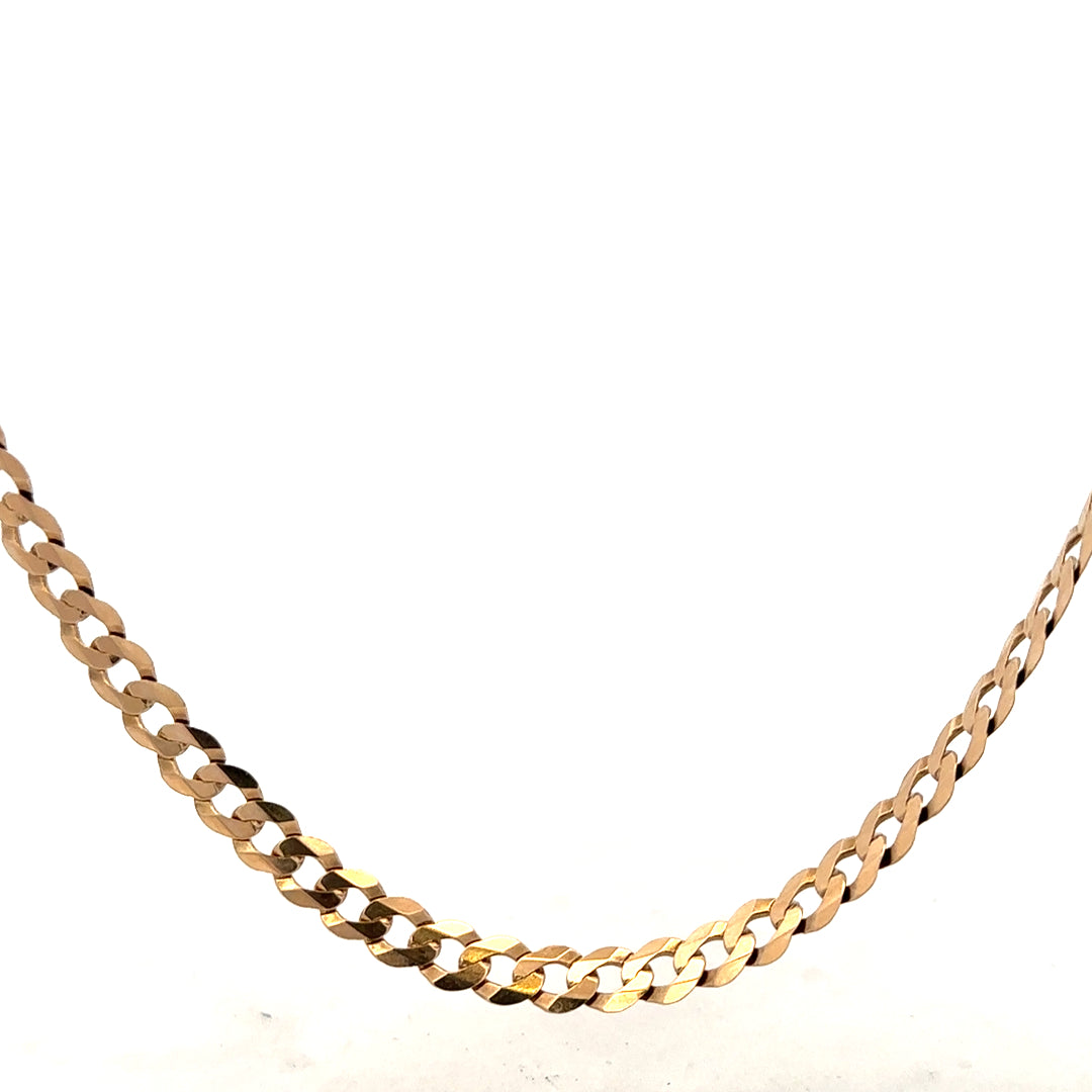 9ct yellow gold curb chain weighing 14.7g, unbranded jewelry with a classic link design, shown in close-up detail.