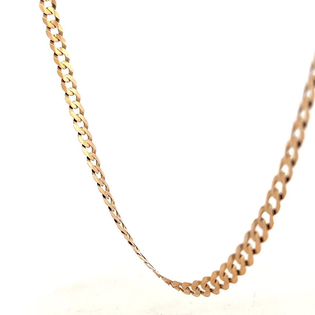 9ct yellow gold curb chain weighing 14.7g, unbranded jewelry with detailed links, close-up view of the gold chain.