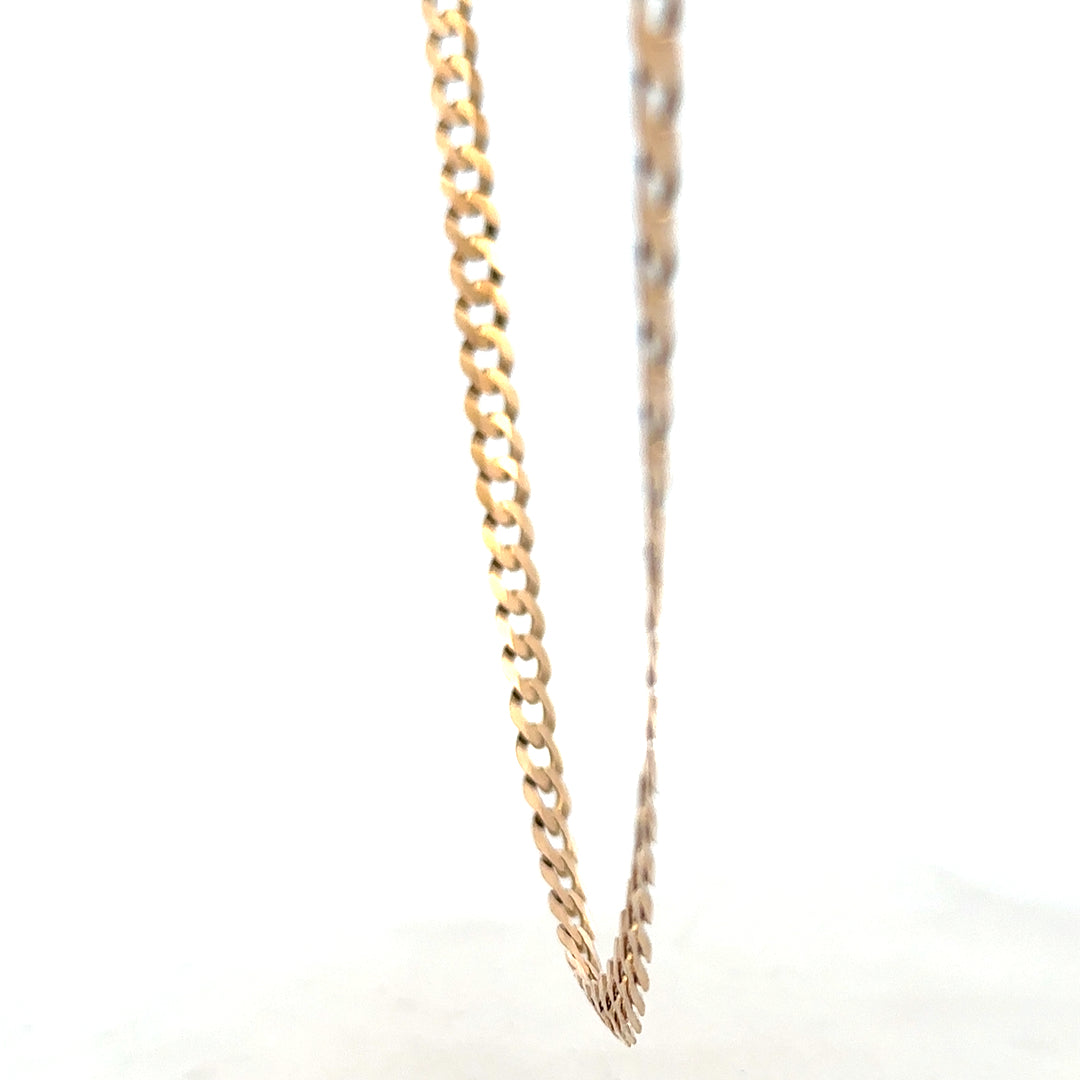 9ct yellow gold curb chain weighing 14.7g, unbranded jewelry with detailed chain links, displayed on a white background.