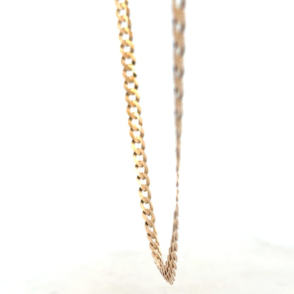 9ct yellow gold curb chain weighing 14.7g, unbranded jewelry with detailed chain links, displayed on a white background.