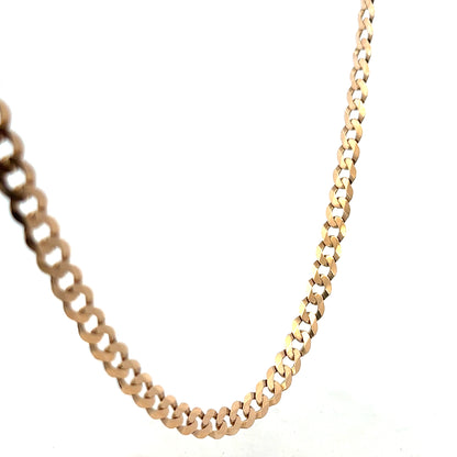 9ct yellow gold curb chain weighing 14.7g, unbranded jewelry accessory with a classic link design.