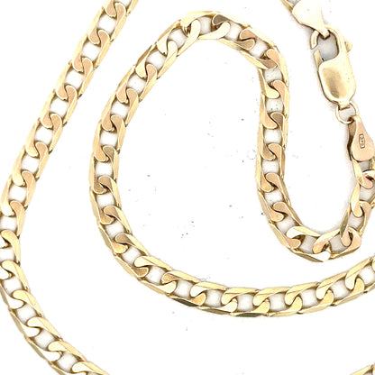 9ct yellow gold curb chain weighing 15.9g, showcasing its bold links and polished finish, perfect for everyday wear.