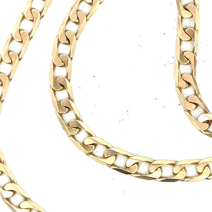 9ct yellow gold curb chain weighing 15.9g, unbranded jewelry with a classic linked design, shown on a plain background.