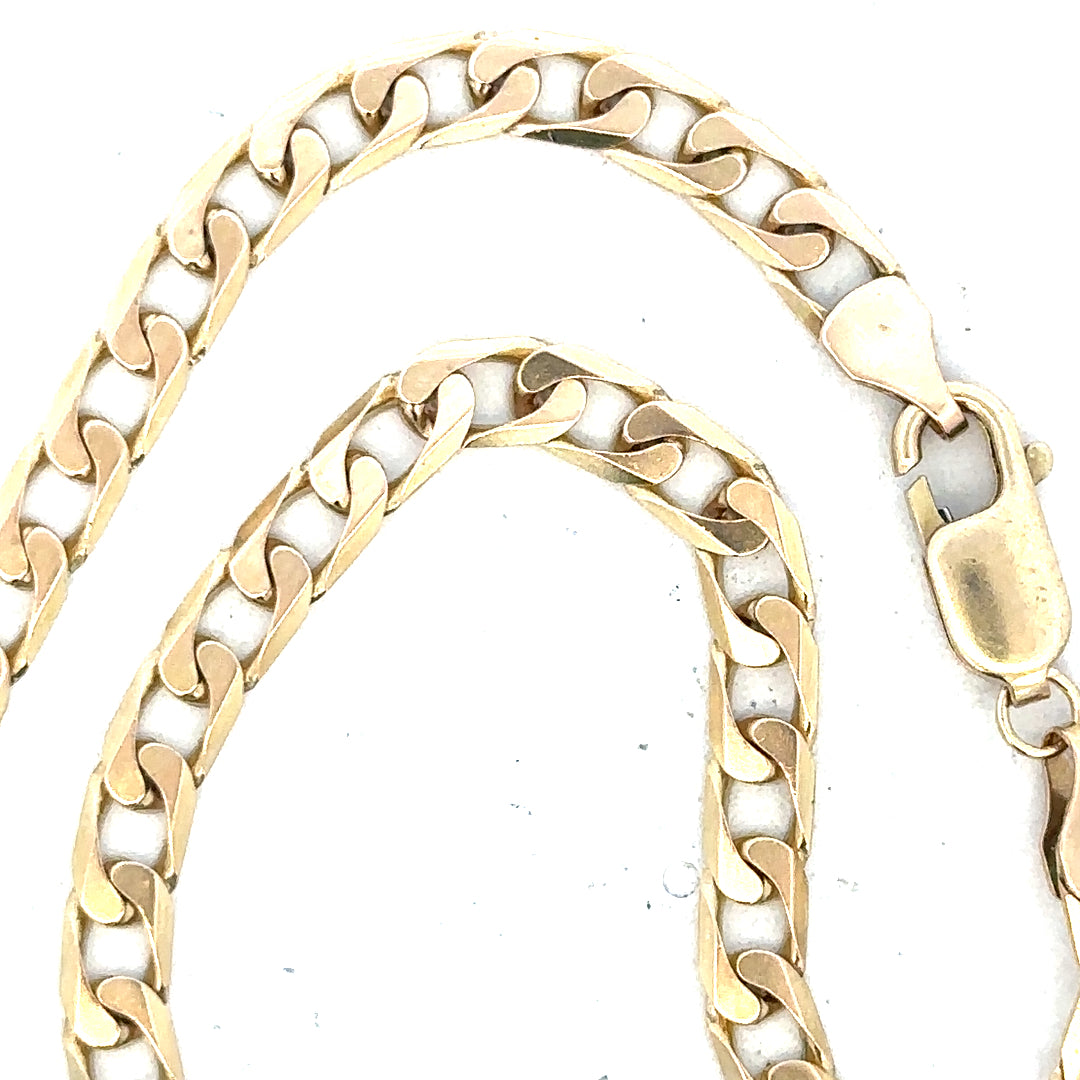 9ct yellow gold curb chain weighing 15.9g, unbranded jewelry with a classic linked design, shown in a close-up image.