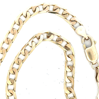 9ct yellow gold curb chain weighing 15.9g, unbranded jewelry with a classic linked design, shown in a close-up image.
