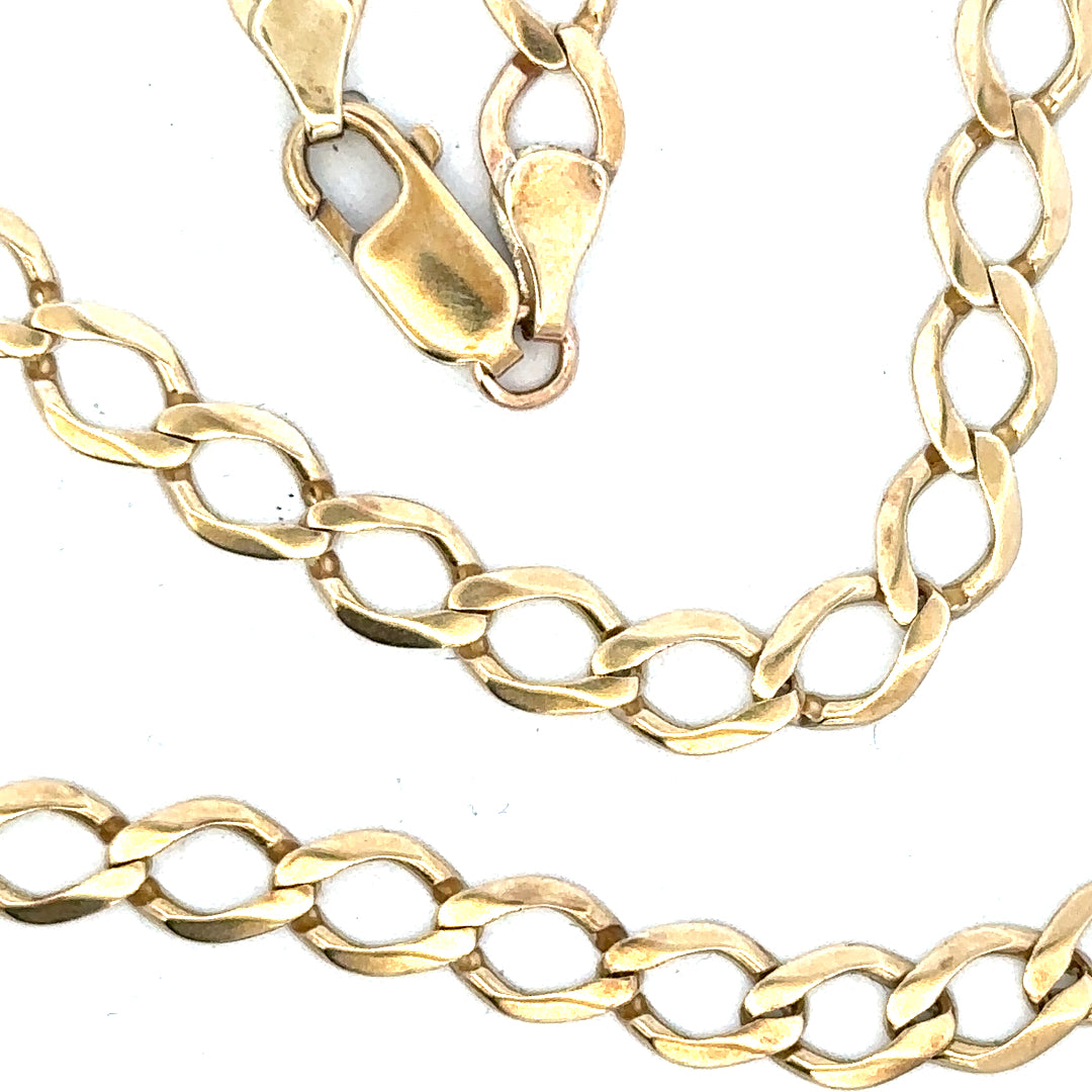 9ct yellow gold curb chain weighing 16.3g, unbranded jewelry with a classic link design, shown in a close-up image.