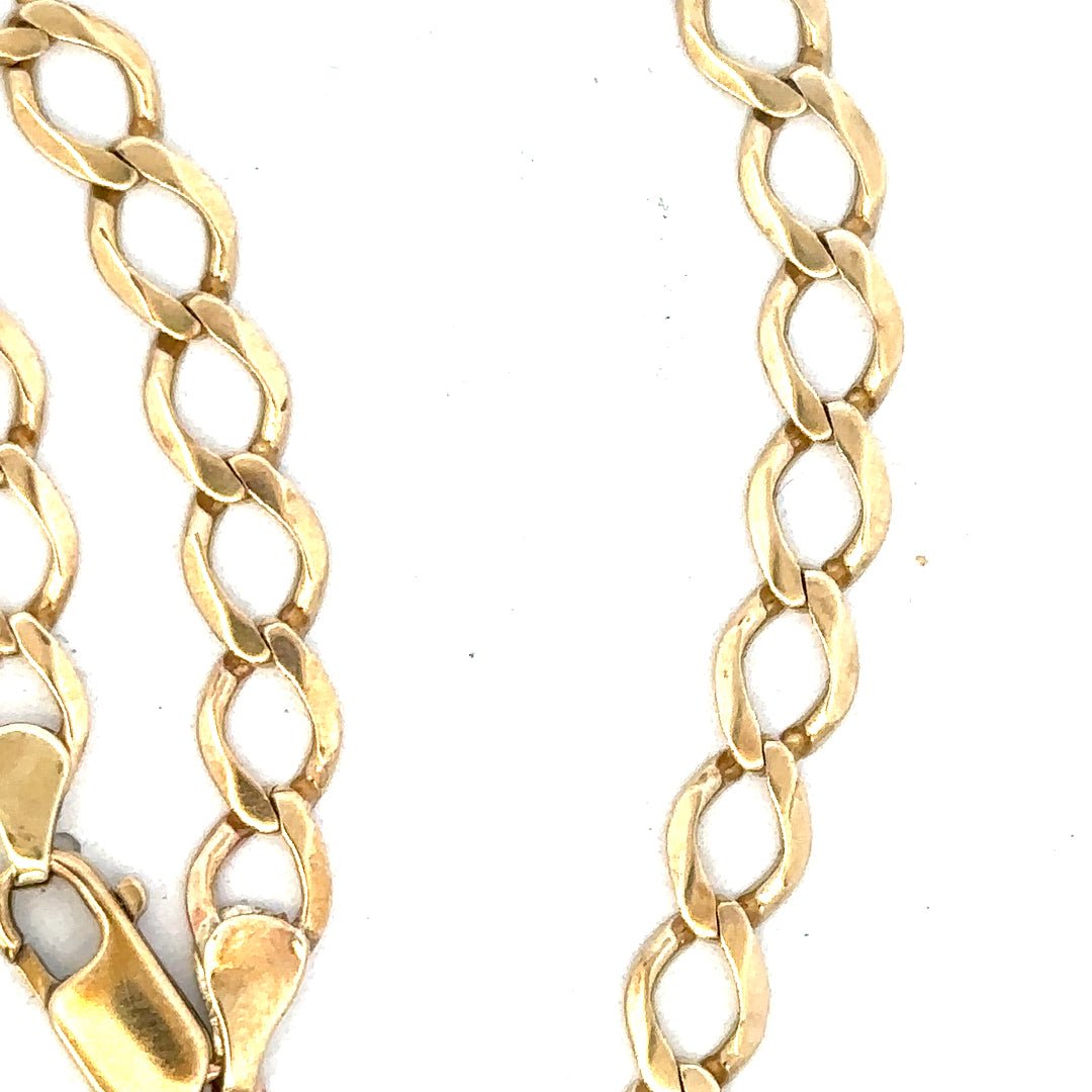9ct yellow gold curb chain weighing 16.3g, unbranded jewelry with a classic linked design, shown on a plain background.
