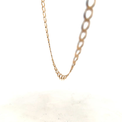 9ct yellow gold curb chain weighing 17.3g, detailed close-up of the linked jewelry chain with a polished finish.