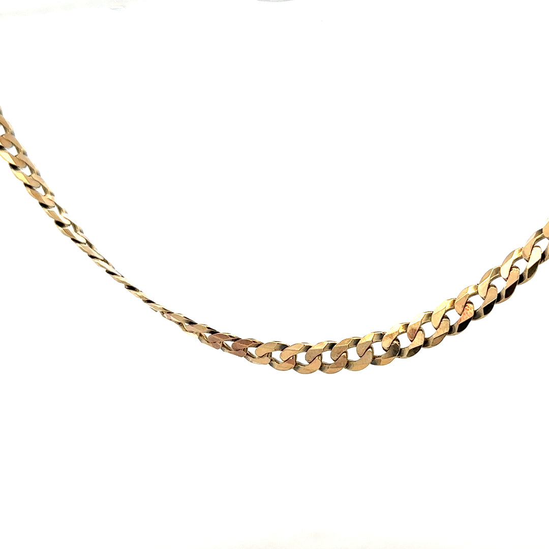 Unbranded 9ct yellow gold curb chain weighing 25.4g with a classic interlocking link design.