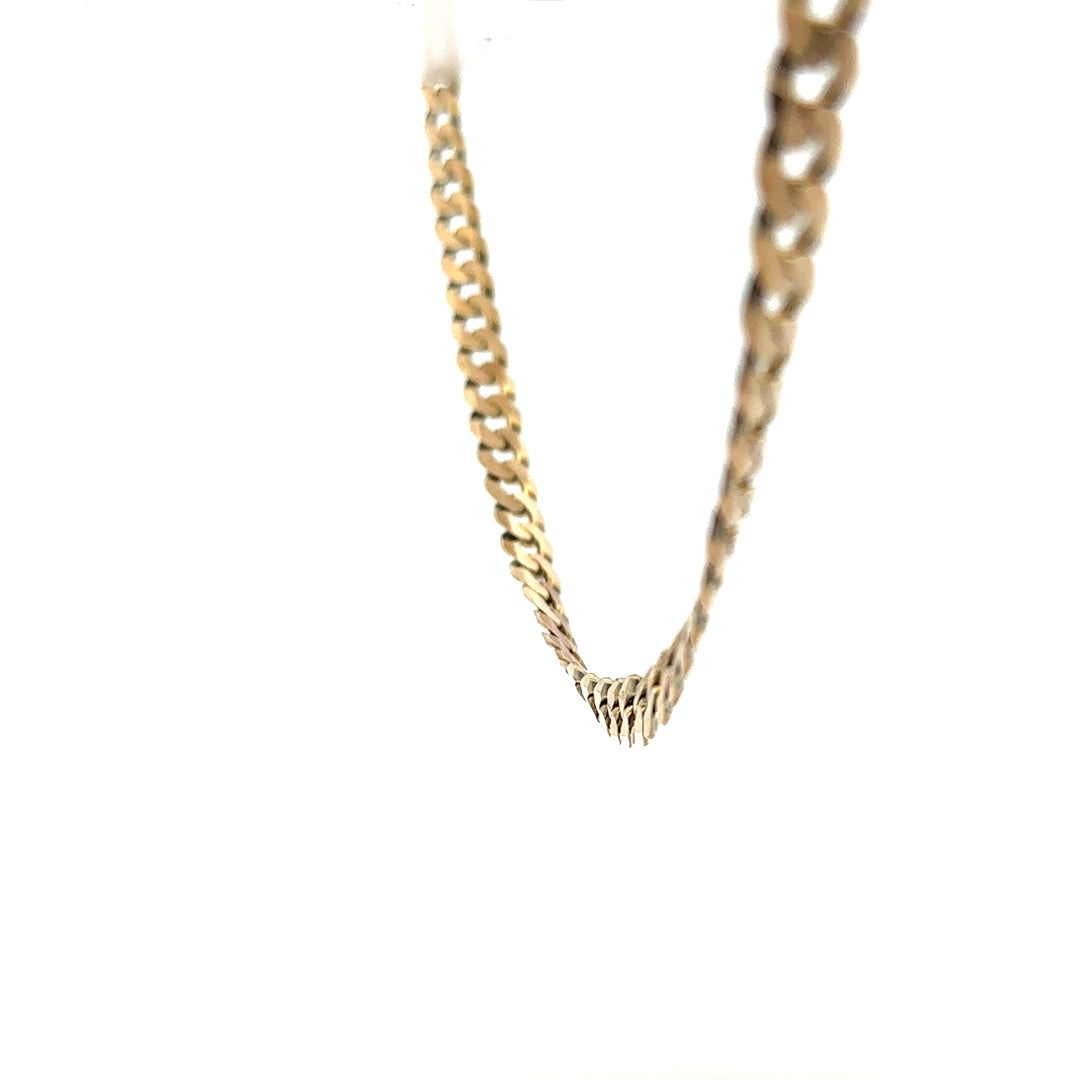 9ct yellow gold curb chain weighing 25.4g, showcasing a sturdy and stylish jewelry piece with a polished finish.