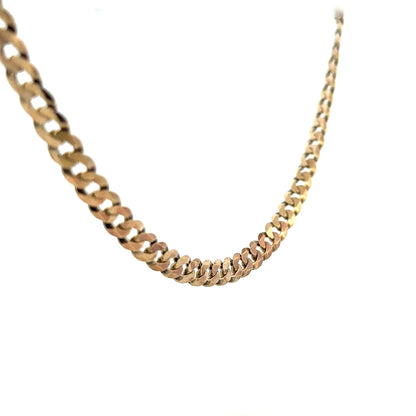 9ct yellow gold curb chain weighing 25.4g, unbranded, showing its detailed links and polished finish.