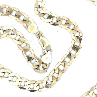 9ct yellow gold curb chain weighing 25.8g, unbranded, with a classic linked design, displayed in a close-up view.
